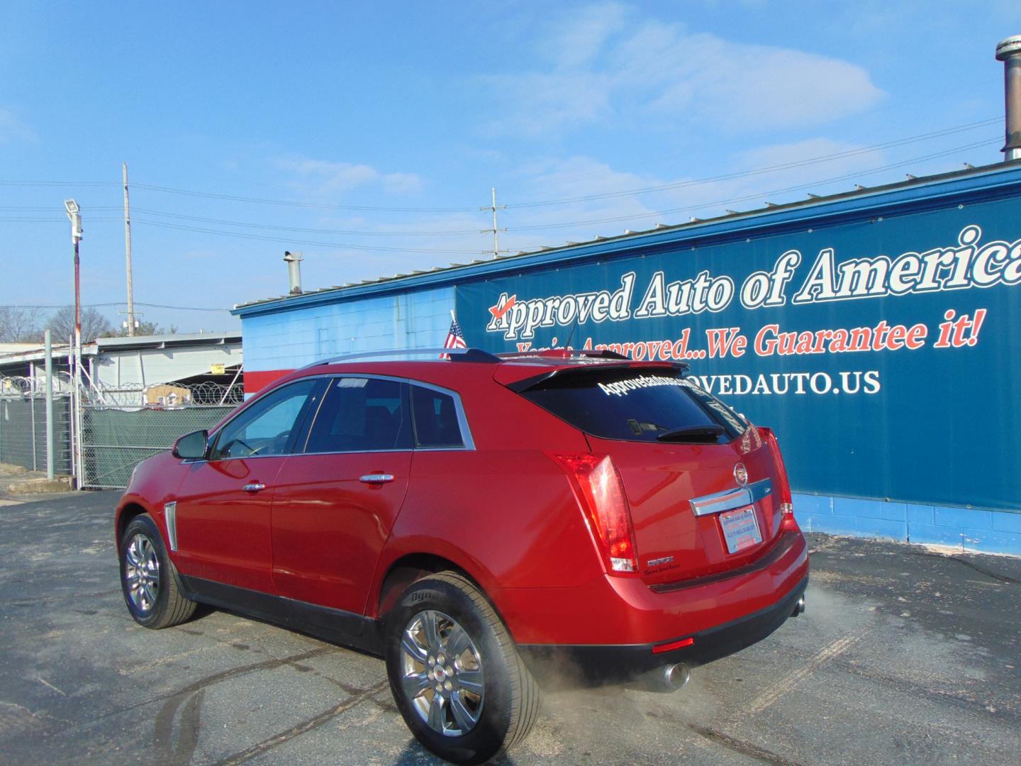 2016 Red Cadillac SRX (3GYFNBE37GS) with an V6 3.6 Liter engine, Auto, 6-Spd TAPshift transmission, located at 2105 Dixie Hwy, Louisville, KY, 40210, (502) 772-3333, 38.220932, -85.795441 - Photo#13